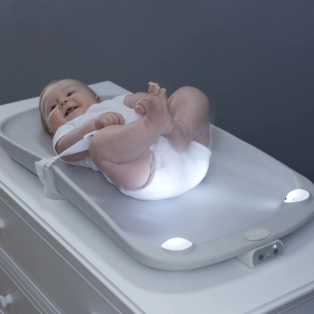 Contours Glow Motion Sensing Light-Up Changing Pad for Dresser or Changing Table Motion Activated Soft Glow Lights Three Brightness Settings Easy to Clean Comfortable and Waterproof